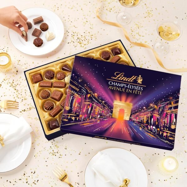 Lindt - Boîte CHAMPS-ÉLYSÉES Édition Avenue en Fête - Assortiment de Chocolats au Lait, Noirs et Blancs